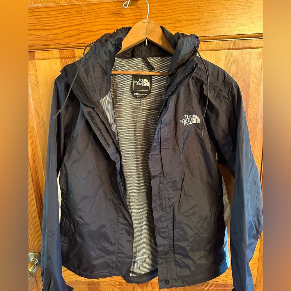 Women’s size S, black/white nylon North Face jacket.